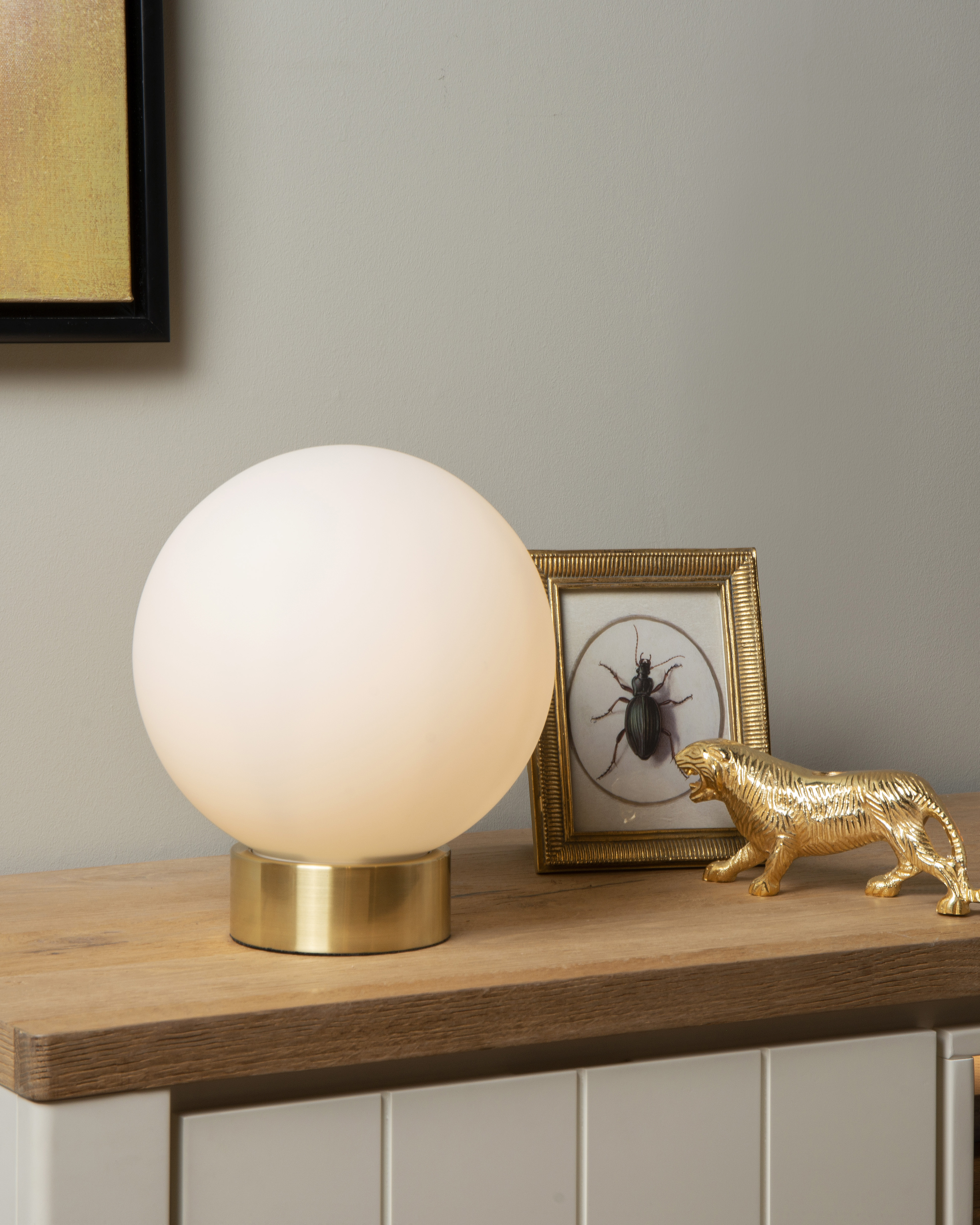 Gold globe store table lamp